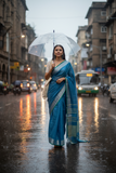 Blue Linen Saree with Green Border