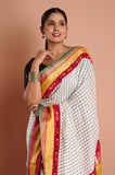 Offwhite Checks Moonga Silk Multicolour Green Border Hand Embroidered Saree