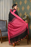 Black linen saree with Pink Border