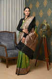 Green Handwoven Katan Silk Banarasi Saree With Black Border