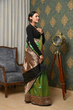 Green Handwoven Katan Silk Banarasi Saree With Black Border